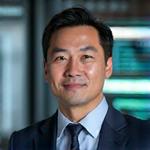 Portrait of Professor Liam Chen, a health technology and data science expert.